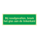 Bij noodgevallen, breek het glas aan de linkerkant