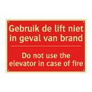 Gebruik de lift niet in geval van brand - Do not use the elevator in case of fire