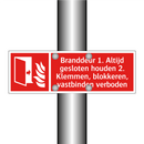 Branddeur 1. Altijd gesloten houden 2. Klemmen, blokkeren, vastbinden verboden