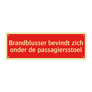 Brandblusser bevindt zich onder de passagiersstoel