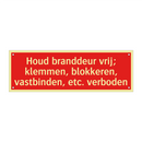 Houd branddeur vrij; klemmen, blokkeren, vastbinden, etc. verboden/.../