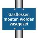 Gasflessen moeten worden vastgezet & Gasflessen moeten worden vastgezet