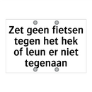 Zet geen fietsen tegen het hek of leun er niet tegenaan