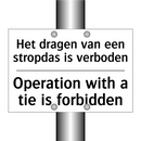 Het dragen van een stropdas is /.../ - Operation with a tie is forbidden/.../