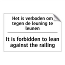 Het is verboden om tegen de leuning /.../ - It is forbidden to lean against /.../