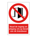 Houd de ingang en uitgang vrij op bevel van de brandweer