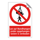 Let op! Rondhangen onder opgehangen lasten is verboden