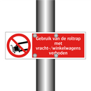 Gebruik van de roltrap met vracht-/winkelwagens verboden
