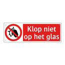 Klop niet op het glas