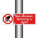 Niet aanraken. Behuizing is actief