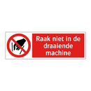 Raak niet in de draaiende machine