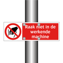 Raak niet in de werkende machine
