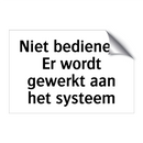Niet bedienen. Er wordt gewerkt aan het systeem & Niet bedienen. Er wordt gewerkt aan het systeem