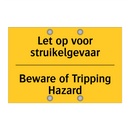 Let op voor struikelgevaar - Beware of Tripping Hazard
