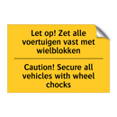 Let op! Zet alle voertuigen vast met wielblokken - Caution! Secure all vehicles with wheel chocks