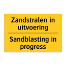 Zandstralen in uitvoering - Sandblasting in progress