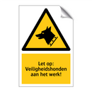 Let op: Veiligheidshonden aan het werk!