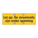 Let op: De stroomrails zijn onder spanning & Let op: De stroomrails zijn onder spanning