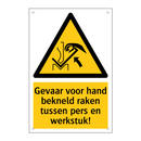Gevaar voor hand bekneld raken tussen pers en werkstuk!