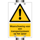 Waarschuwing voor een transportsysteem op het spoor
