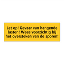 Let op! Gevaar van hangende lasten! Wees voorzichtig /.../