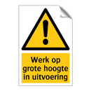 Werk op grote hoogte in uitvoering & Werk op grote hoogte in uitvoering