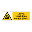 Let op, voertuigen worden gelost