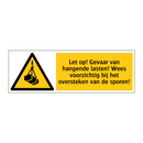 Let op! Gevaar van hangende lasten! Wees voorzichtig bij het oversteken van de sporen!
